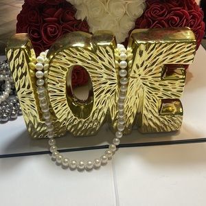 Cultured freshwater white Pearls 8-9 mm rhodium over SS 18” strand. Quality.